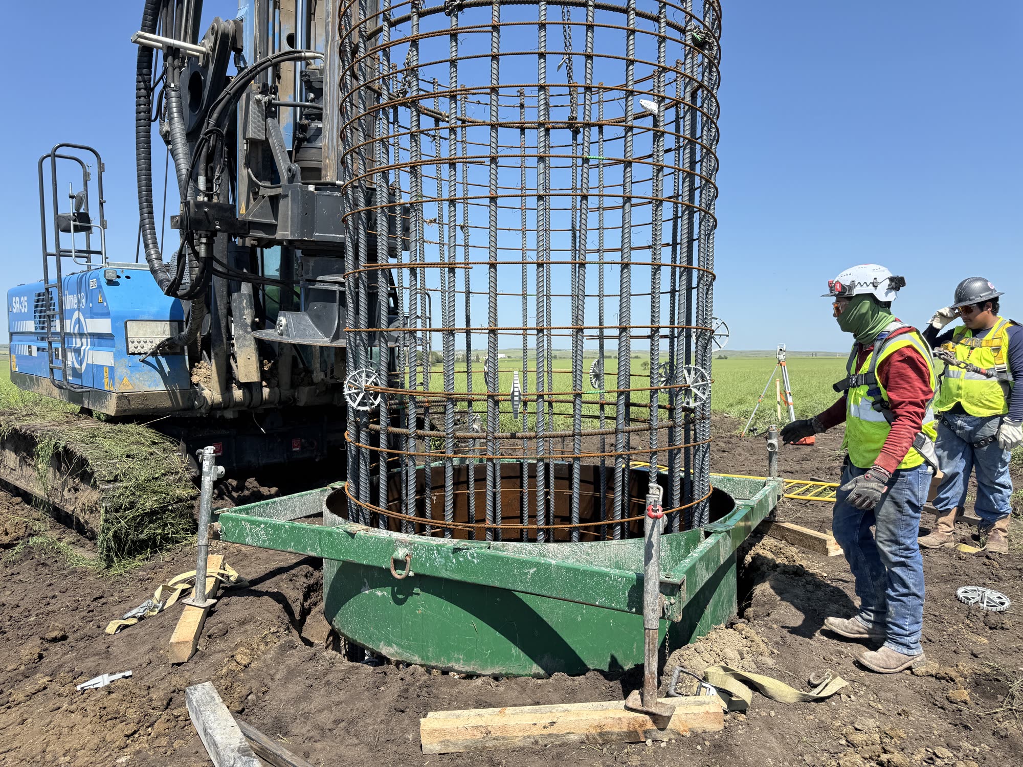 Powerline foundation cage going into the hole