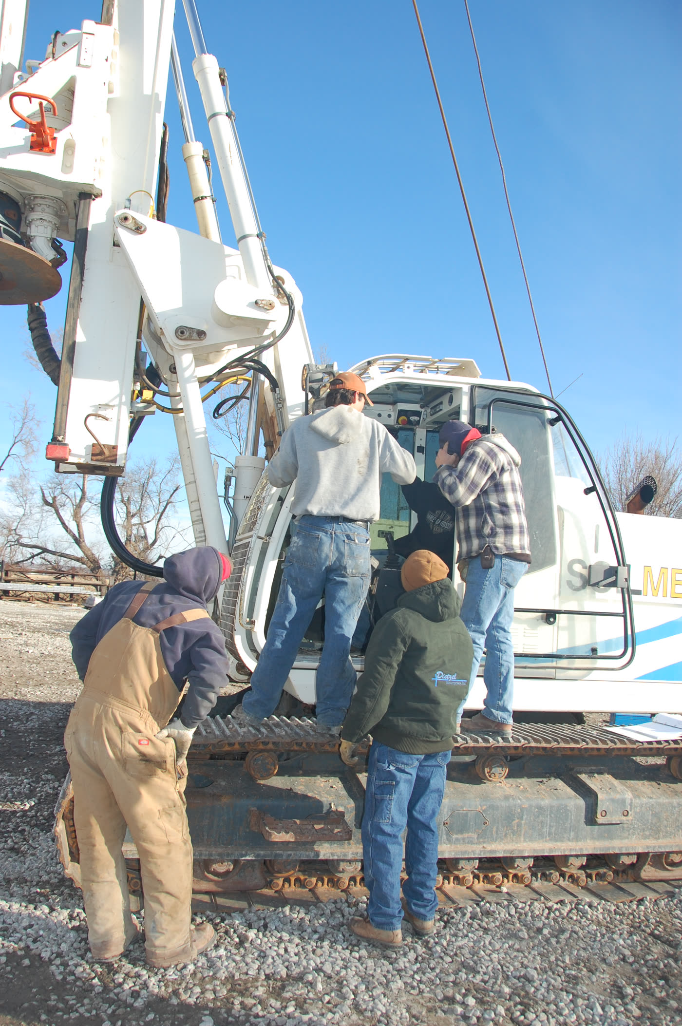Dietzel crew around a Soilmec cab in the yard